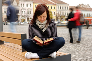 A student reads in the city